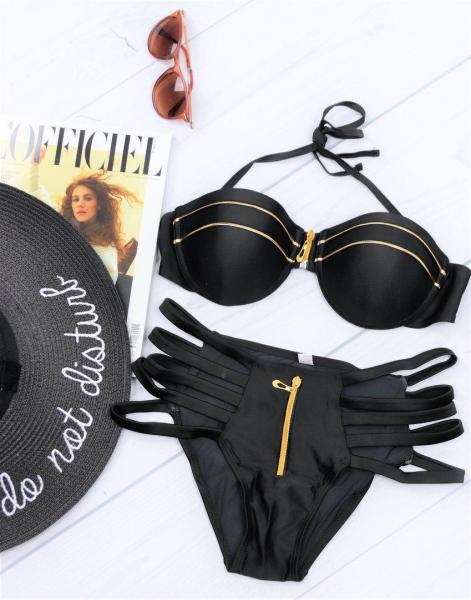 Раздельный черный купальник с молниями.