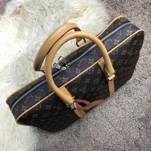 Фото Сумки Louis Vuitton Porte-Dociments Voyage PM Monogram