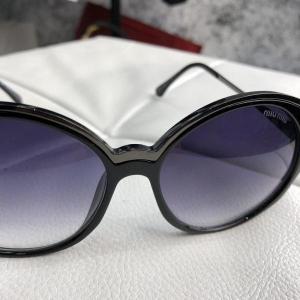Фото Аксессуары Miu Miu Sunglasses Round Reveal Black