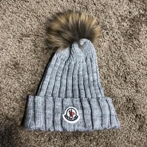 Фото Аксессуары Moncler Winter Hat Knitted Pompon Gray
