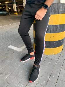 Фото Одежда Утеплённые штаны Ellesse Черные