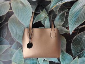 Фото  Женская кожаная сумка 