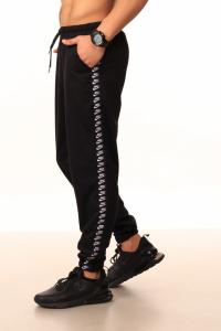 Фото  Штаны чёрные с лампасами Nike