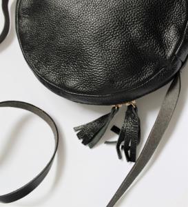 Фото  Женская кожаная круглая сумка 