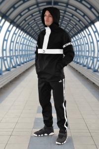 Фото  Спортивные штаны Puma XTG Woven Pants (Чёрные)