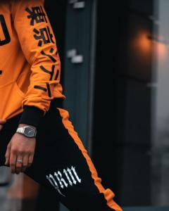 Фото Одежда Cпортивные штаны Sad Smile Черно-Оранжевый