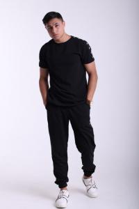 Фото  Штаны чёрные с лампасами Stussy