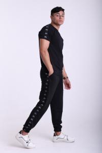 Фото  Штаны чёрные с лампасами Stussy