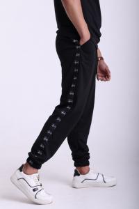 Фото  Штаны чёрные с лампасами Stussy