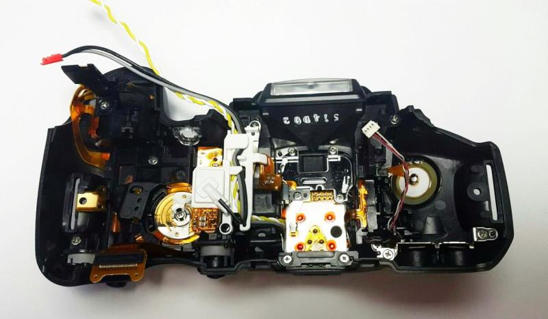 Фото Корпусные детали для фотоаппаратов, объективов, вспышек, Верхние части корпусов фотокамер Верхняя часть корпуса фотокамеры Canon 650D с органами управления - НОВАЯ!