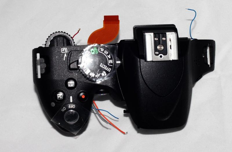 Фото Корпусные детали для фотоаппаратов, объективов, вспышек, Верхние части корпусов фотокамер Верхняя часть корпуса фотокамеры NIKON D5100 с органами управления - НОВАЯ!